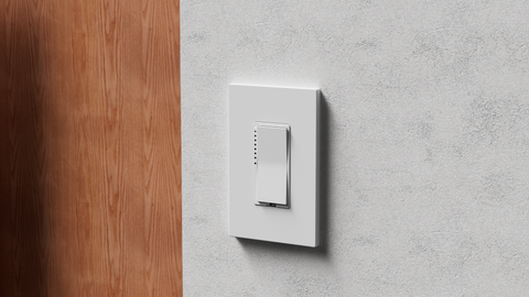 White dimmer switch on a wall