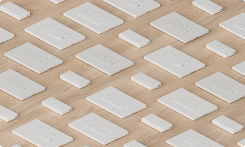 Insteon switches, controls, and covers on a wood surface