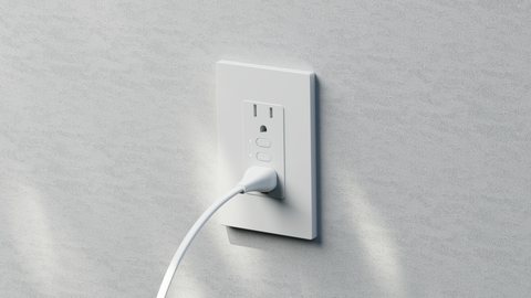 A white outlet with switches and a plug